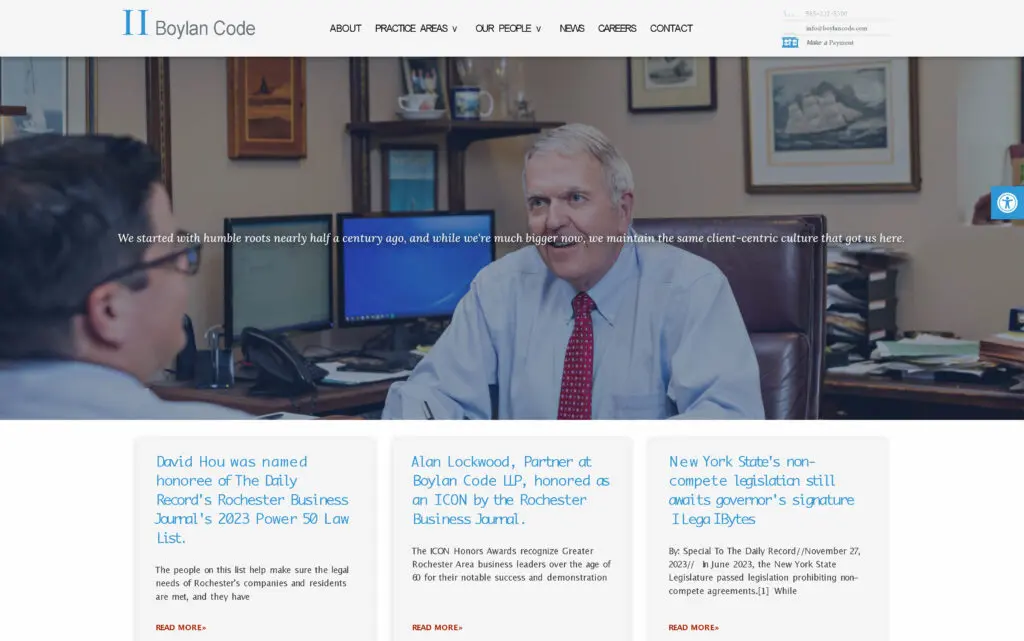 Professional lawyer consulting in an office setting, showcasing a client-centric culture at Boylan Code LLP, a law firm with a history of excellence in Rochester.