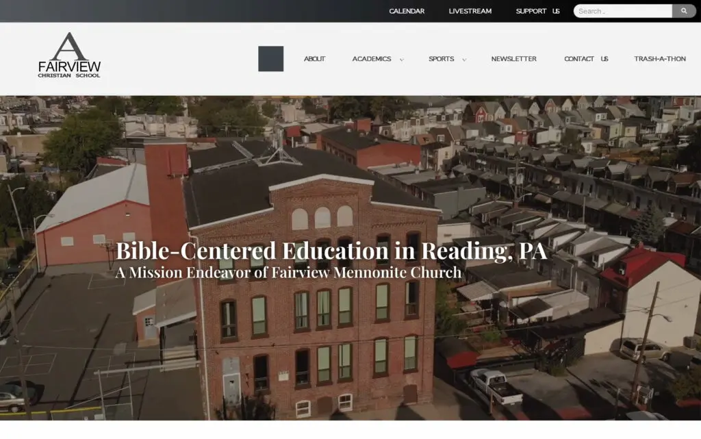Aerial view of Fairview Christian School, showcasing its brick building and surrounding neighborhood in Reading, PA, emphasizing its mission of Bible-centered education as part of Fairview Mennonite Church.